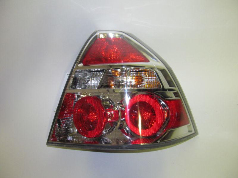 09 2010 2011 chevrolet aveo sedan oem right tail light nice!