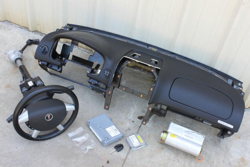 04-06 pontiac gto dash w/ air bags, steering column, bcm, & key oem