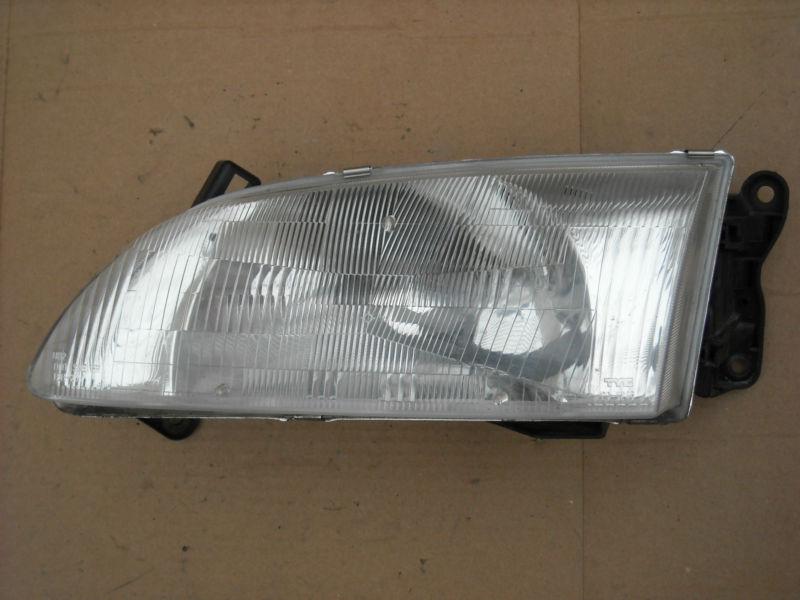 98 99 mazda 626 lx headlamp light l/h