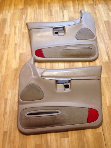 95 -98 ford explorer front (2) driver &amp; passenger oem door panels tan power