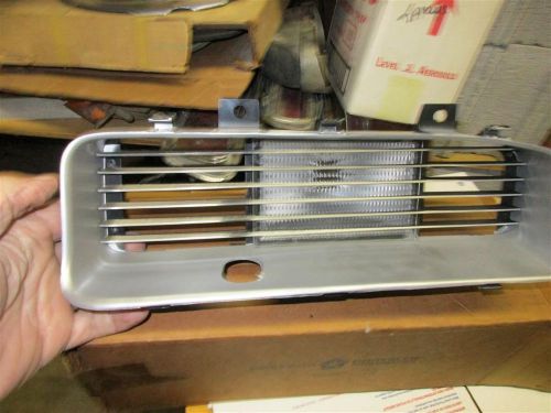 Nos- 73 fury lower right grille and parking lamp assy
