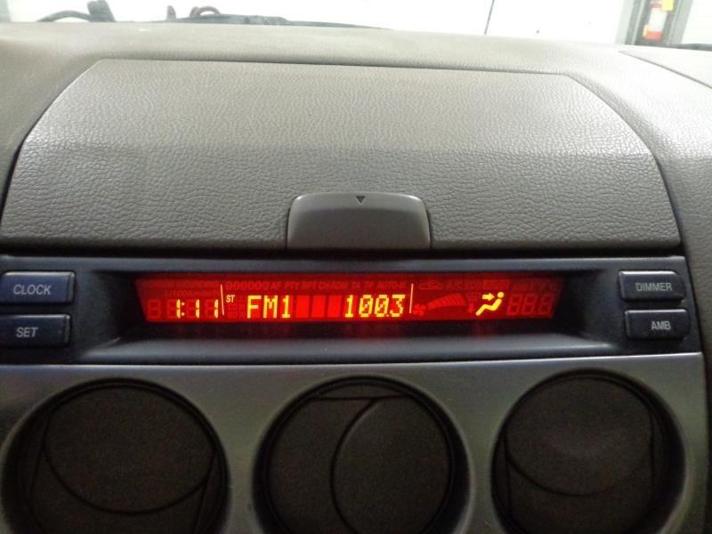 03 04 mazda 6 audio equipment display radio temp clock