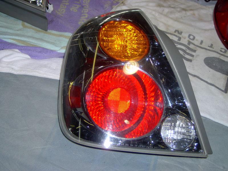 2002 nissan altima   tail light - left/driver side