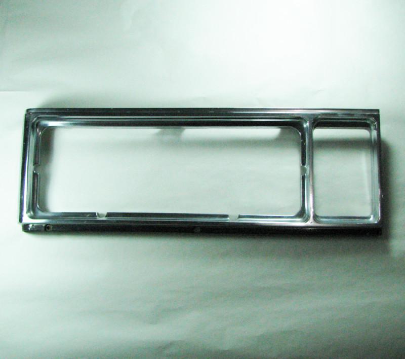 77-79 cadillac deville headlight bezel l.h.