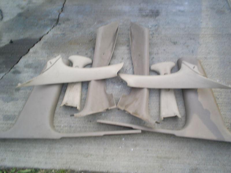 97 98 99 00 01 02 03 pontiac grand prix tan interior trim pieces