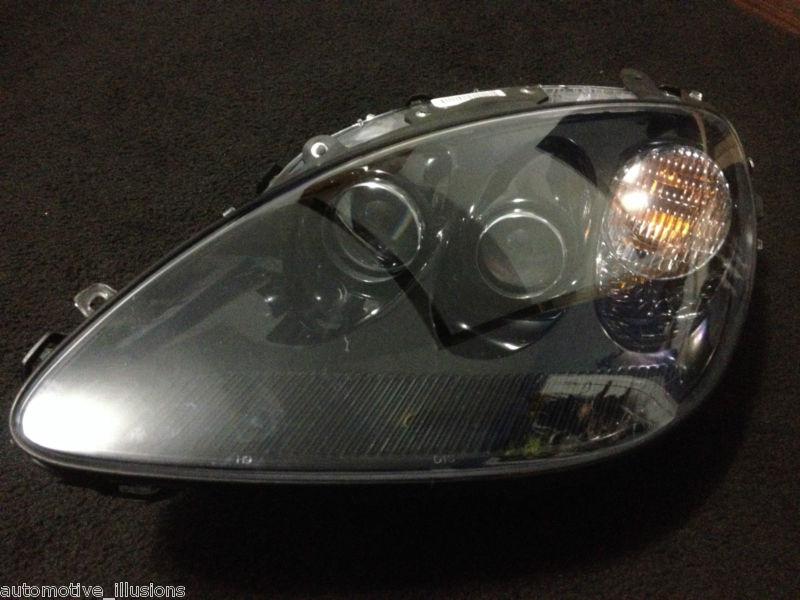 05-13 corvette oem rh driver side head light (black)