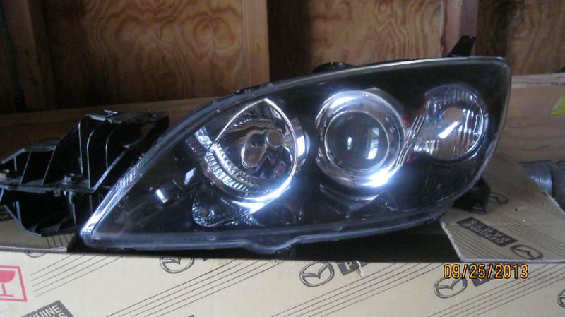 2007 mazda 3 lh headlamp