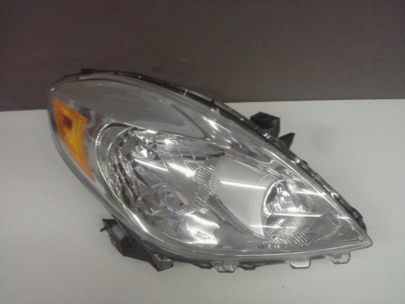 12 13 nissan versa  right headlight headlamp used oem 