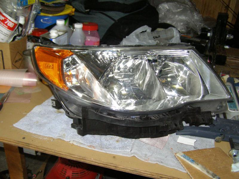 2009-2013 subaru forester used right (passenger) side headlight oem 