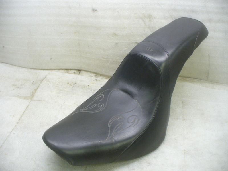 Harley 07-up softail flame stiched leather seat.