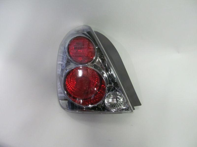 05 06 nissan altima left tail light nice!