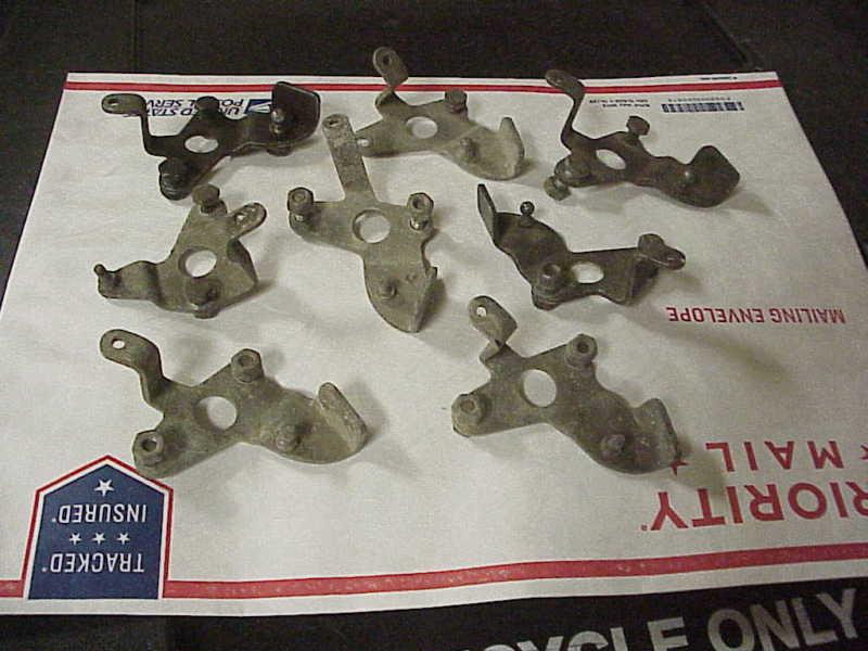 Early pontiac quadra-jet carburetor throttle cable brackets group of 8  off carb