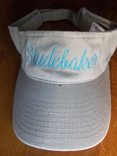 Tan adjustable cotton visor with embroidered studebaker blue stitching - new !