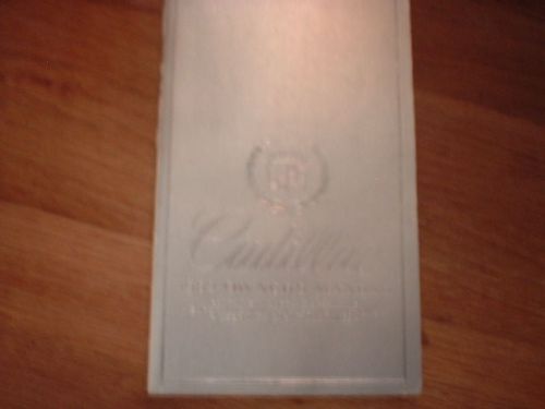 1982 cadillac owner&#039;s manual w/plastic case