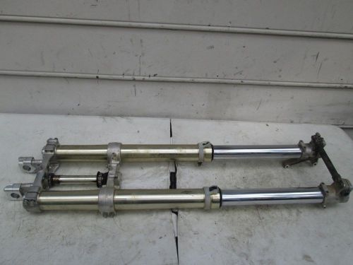 2000 rm 250  triple clamp ,forks and wheel axle oem stock