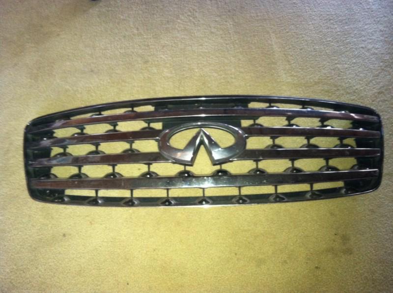 2003-2005 infiniti grille factory part number 62310-cg000 used 