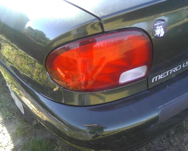 Left tail light, 2000 chevy (geo) metro