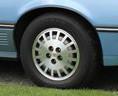 * 14 inch factory alloy rim - cadillac cimarron / 1985-1988