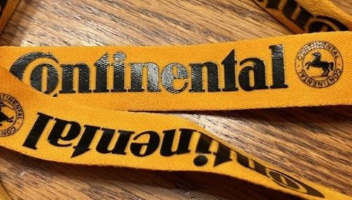 (2) continental tire lanyards - yellow with black lettering and logo