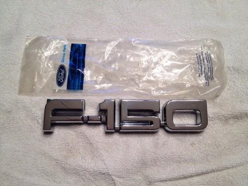 Nos oem ford truck f150 f-150 name plate emblem badge e7tz-16720-a