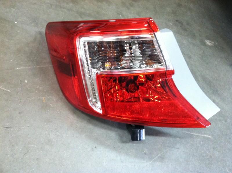 Driver's side outer taillight brake light for 2013 toyota camry hail damage!