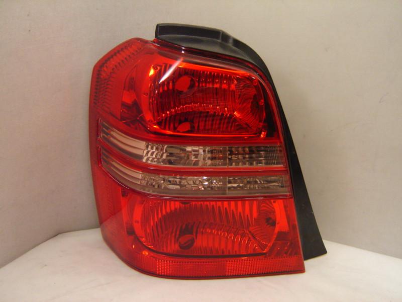 Toyota highlander left tail light 00 01 02 03 oem