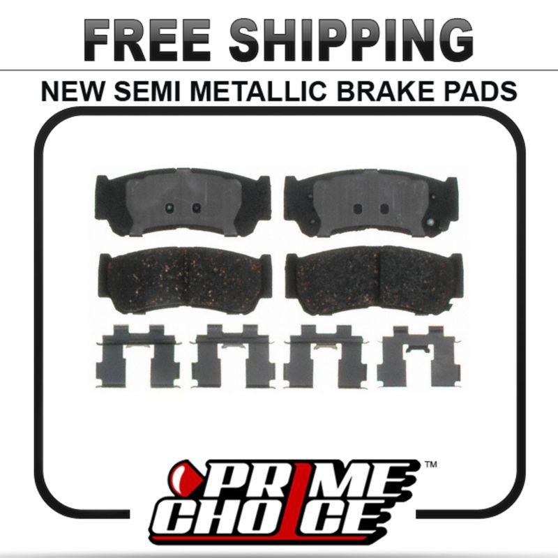 New premium complete set of rear metallic disc brake pads with shims