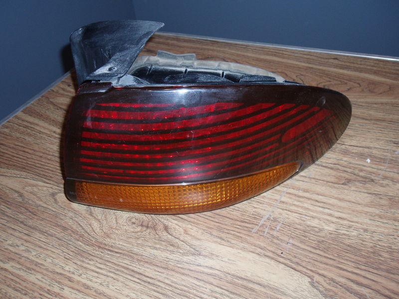 1996-99 pontiac bonneville tail light choice of left or right driver passenger 