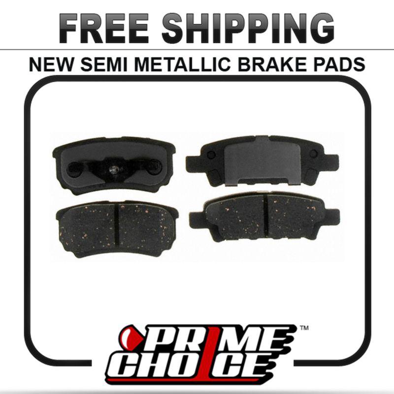 New premium complete set of rear metallic disc brake pads with shims