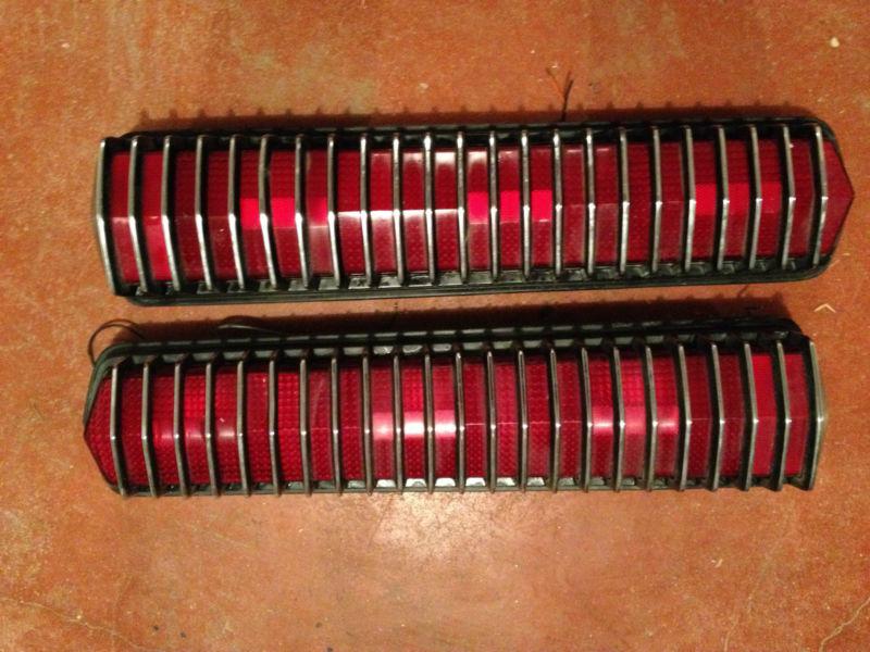 Pair of 1969 shelby mustang gt 350 / mecury cougar tail light assemblies