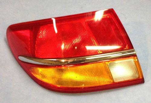 2002 2003 saturn l100 l200 l300 drivers side left tail light ***no reserve***