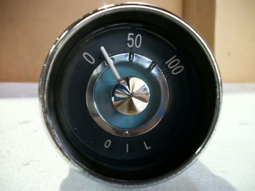 Volvo p1800 oil pressure gauge. good lens 1961-1969 vintage oem.