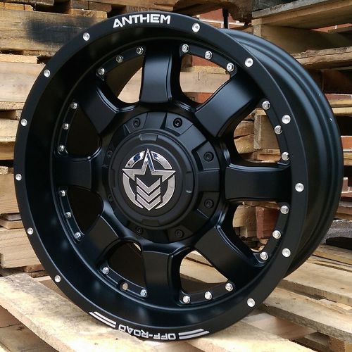 18x9 matte black anthem commander 8x6.5 +0 rims trail blade mt 35 tires