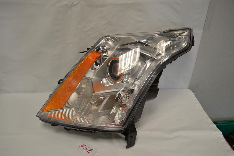 Cadillac srx 2010-2011-2012 drivers  side oem headlight oem