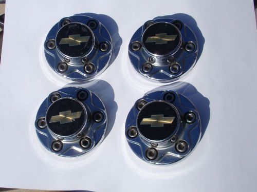 Set of 4 silver chevy center resin caps part# 15550420-b/15550430-c 7&#034; diameter