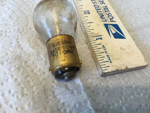 Ford; chrysler; gm; studebaker; old car light bulb,   pn 1594.   item:  0048