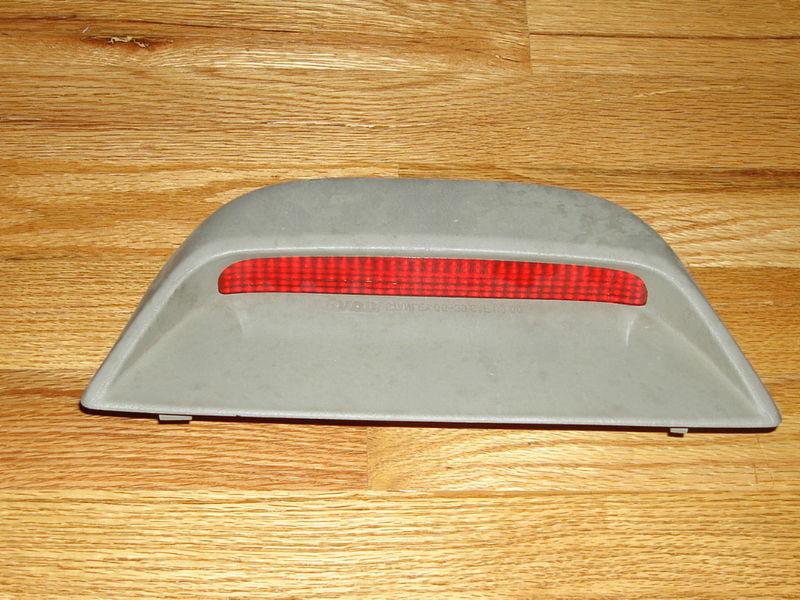 98-02 tayota corolla third brake light, center back stop light oem gray in color