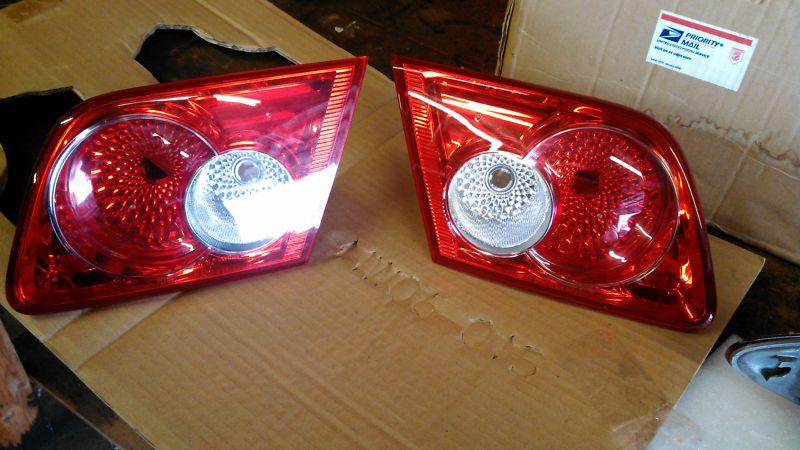 03-05 mazda 6 trunk lid tail lights pair, driver & passenger side mounted oem