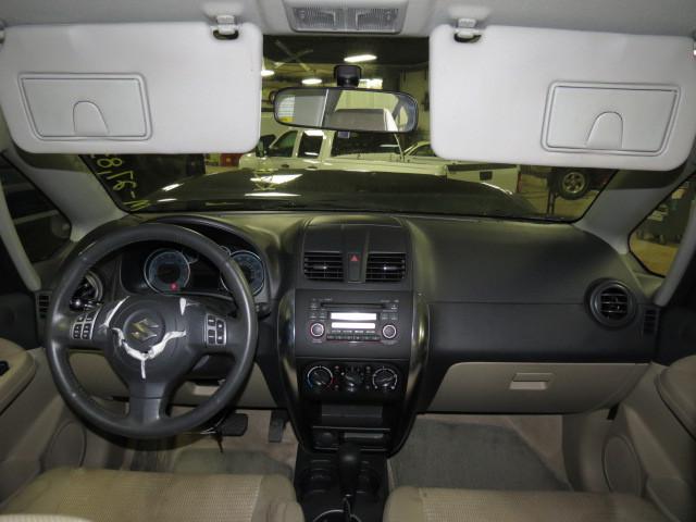 2010 suzuki sx4 floor center console tan 2543476