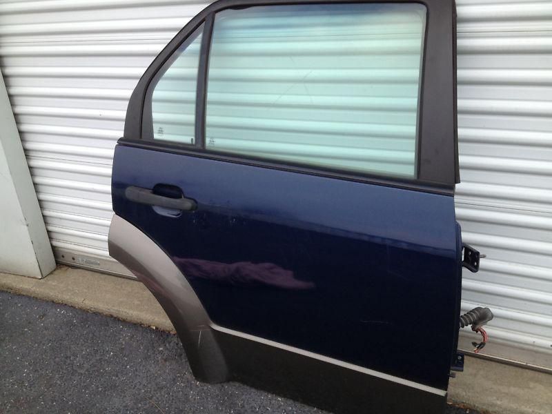 05 06 07 freestyle passenger side rear side door elec tinted complete