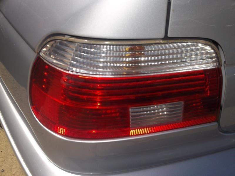 Left taillight for 01 02 03 bmw 525i ~ sdn w/clear lens 4738208