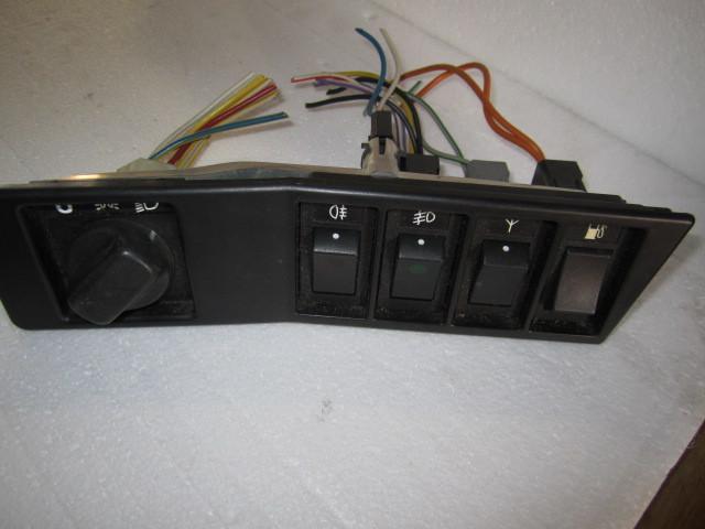 Volvo 780  87-91 1987-91  dash bezel w/ antenna fuel fog light headlight switch