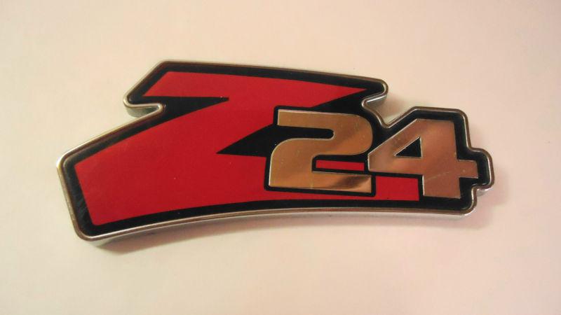 Used genuine oem gm chevy cavalier "z24" emblem # 22623646 fits fender 2000-2004