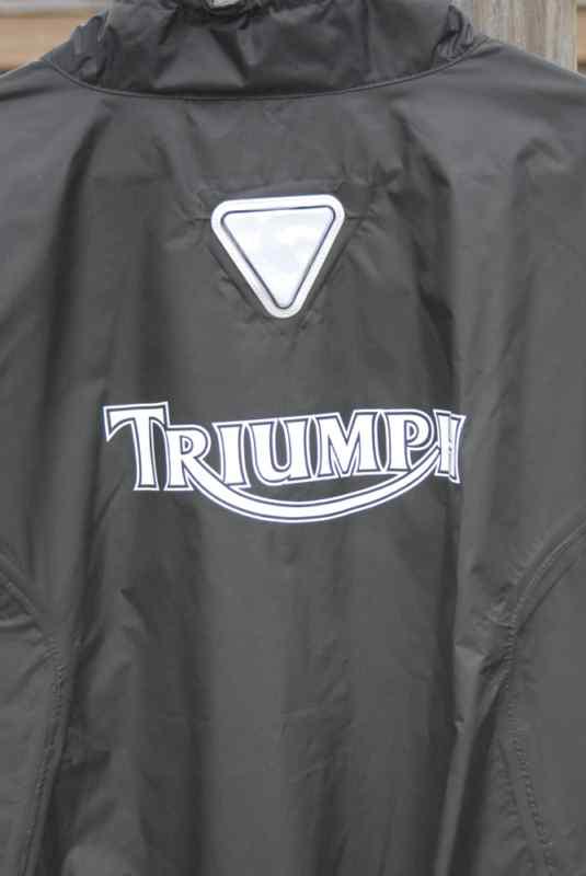 Mens triumph rain jacket size large. like new cond.  more like extra large.