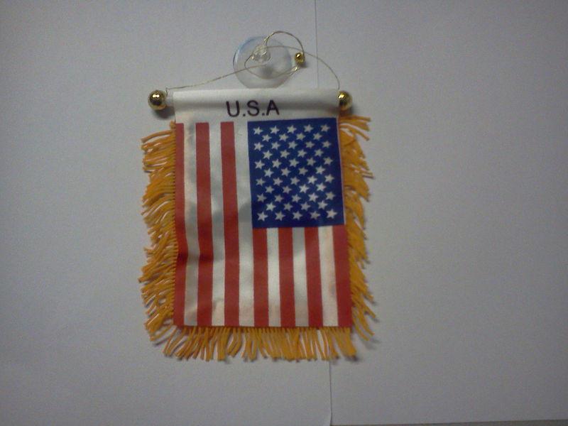 American flag hangs from mirror/suction cup for windshield/window car truck auto