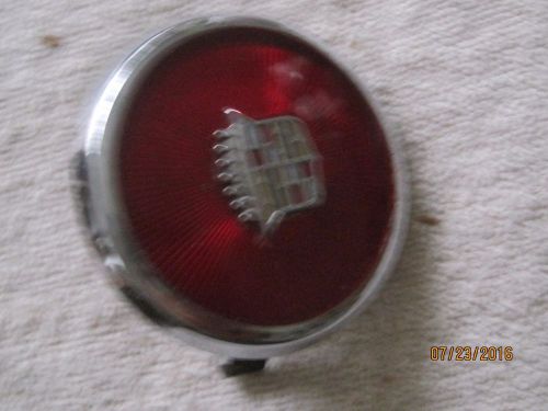 Nos 1962?-1963? cadillac horn cap-part number 1479423