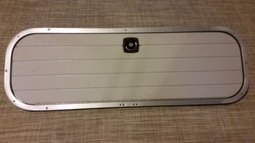 Ski locker storage hatch door for boat compartment storage