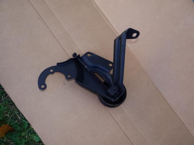 Jeep wrangler tj power steering pump mount - idler adjustment bracket. 97-02