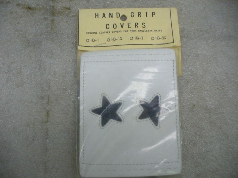 Harley/bikers boutique white with black stars  leather hand grip covers,2 total.