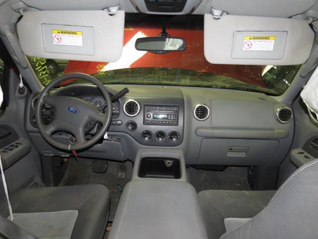 2004 ford expedition speedomter and radio trim dash bezel 2510693